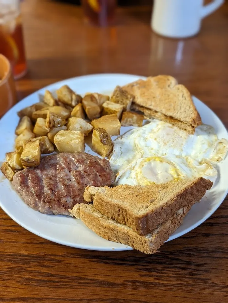 Eggs Sausage Home Fries and Toast