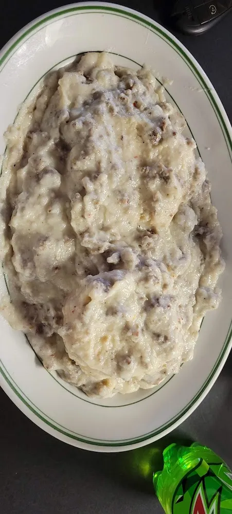 Sausage and Gravy over Biscuits
